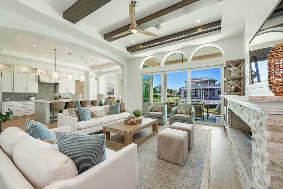 The luxurious open-concept living space is a highlight of this beautiful home