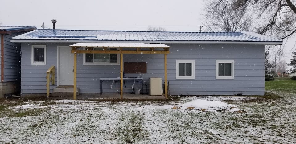 Back view of Cottage A. Double fish cleaning station available for use.