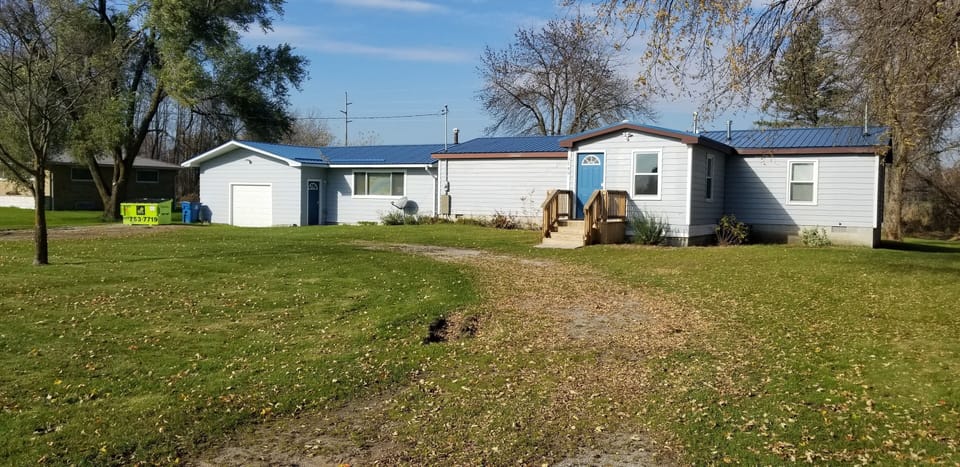 Front view of both Cottage A and Cottage L.  Spacious area for parking. 
