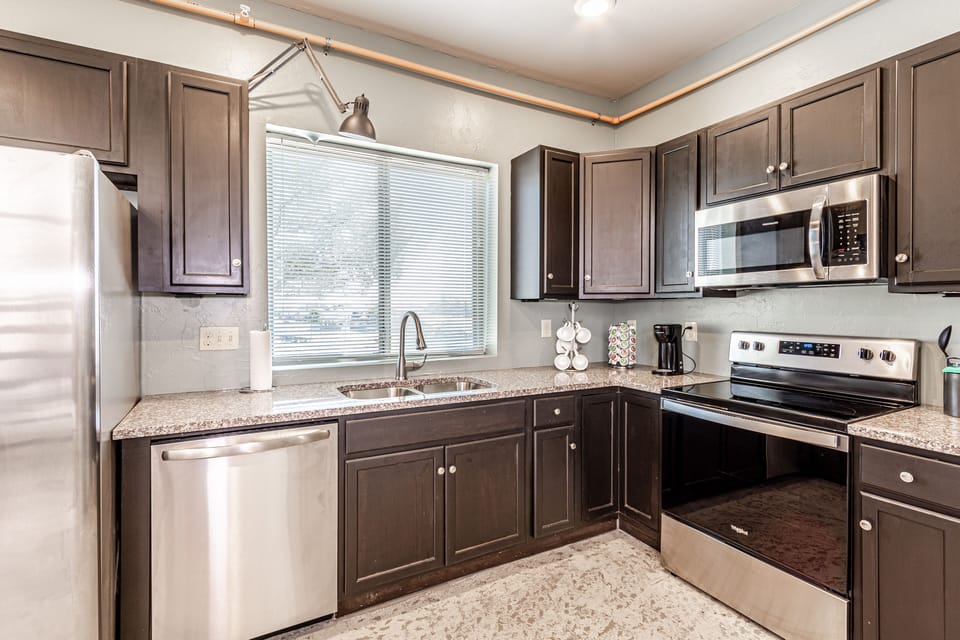 Cooking basics provided with pots and pans and utensils. 