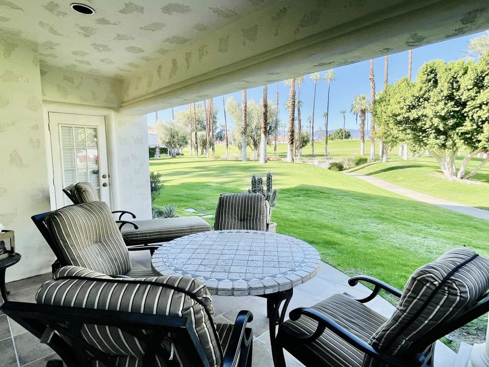 Private patio steps from pool/ hot tub 