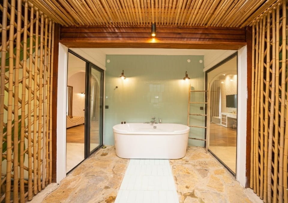 Secret Garden House | Egyptian cotton sheets, premium bedding, Select Comfort beds, minibar