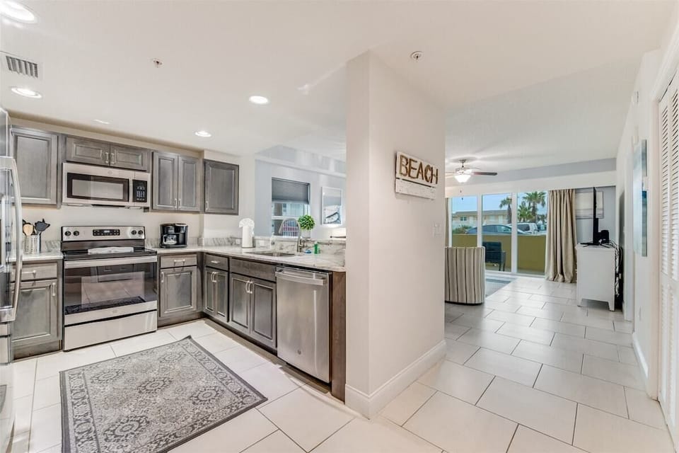 Alternate view of the kitchen and living area