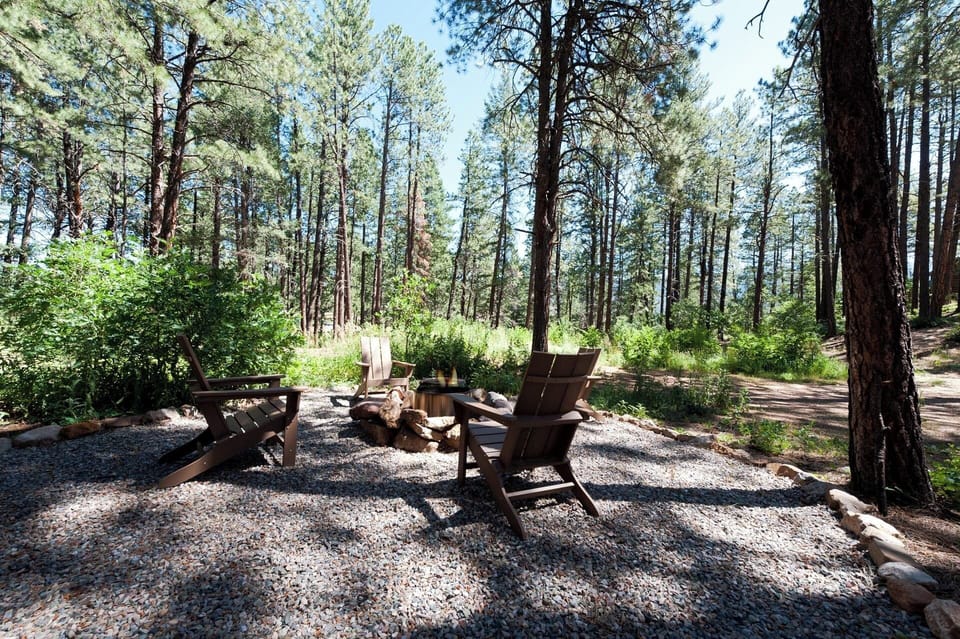 Wood burning firepit next to the cabin