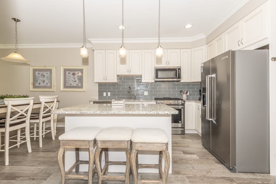 Modern kitchen and island with seating for 3