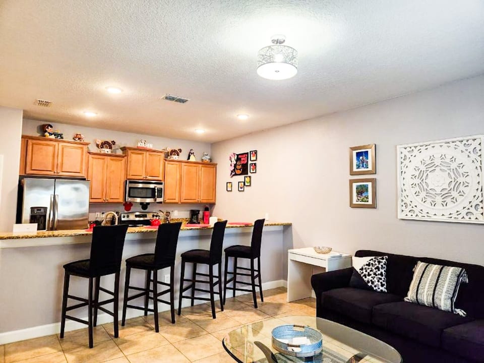Open space- Living area.  Kitchen with breakfast bar.  