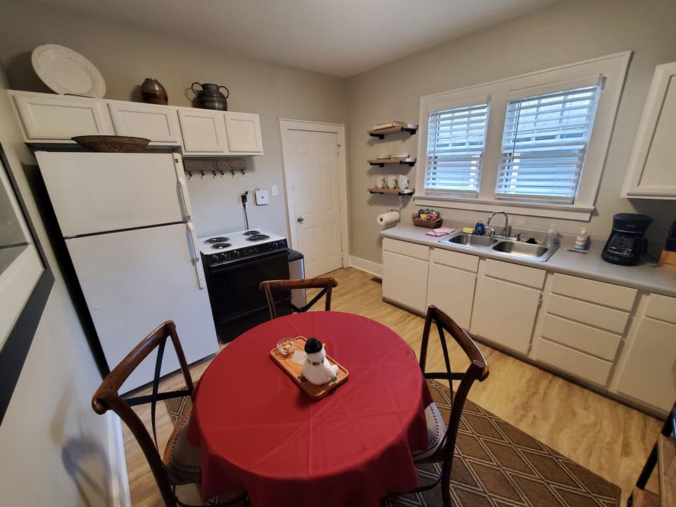 Open kitchen with full-size appliances and fully stocked kitchen