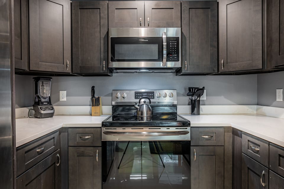Full Kitchen with Quartz countertops and cooking supplies, Keurig coffe 