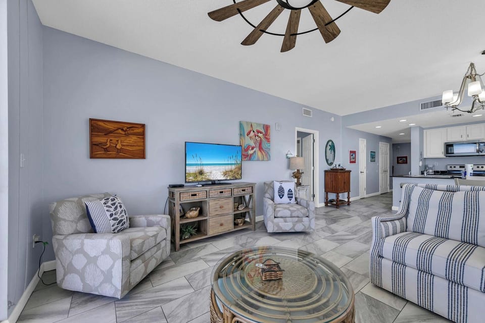 Living room has a large flat-screen TV