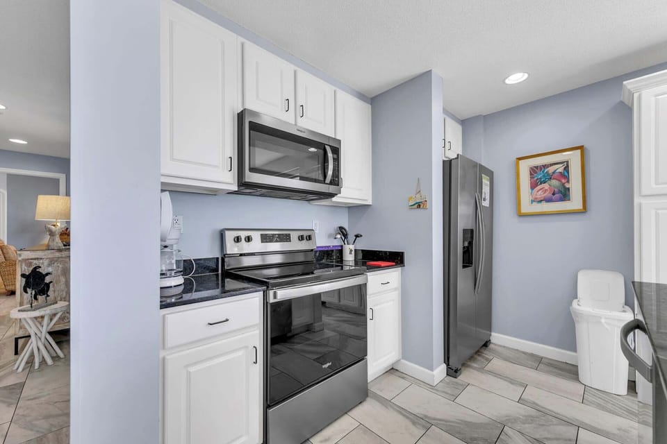 Kitchen has stainless steel appliances