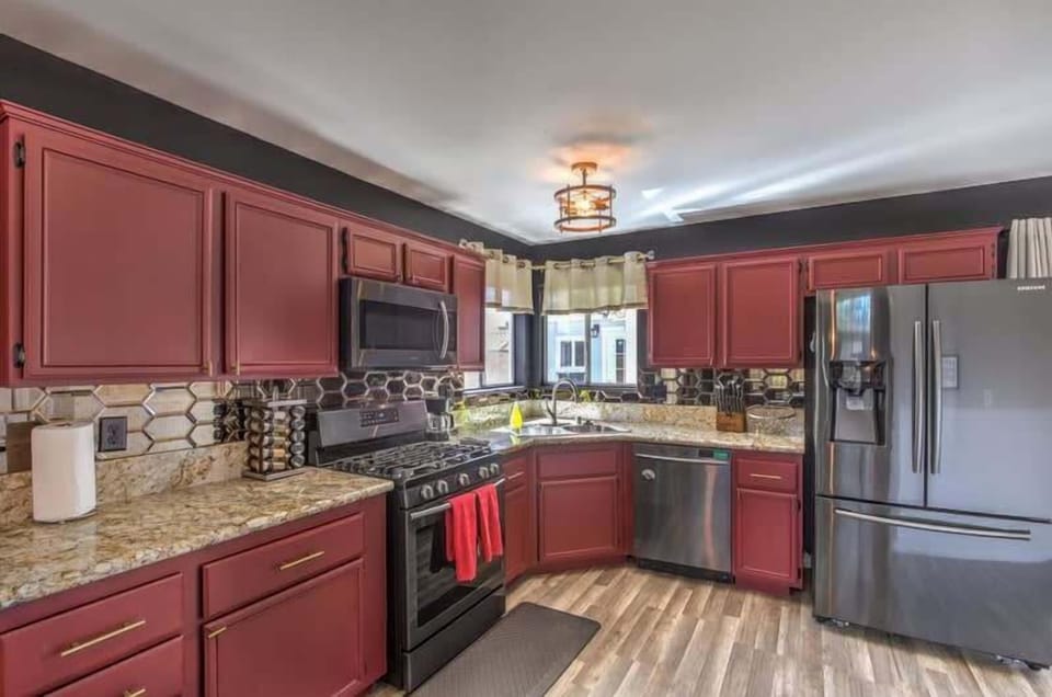If you love cooking, this kitchen is going to be your favorite part of our home. It's modern, classy, and fully stocked. You have to experience it to believe it.