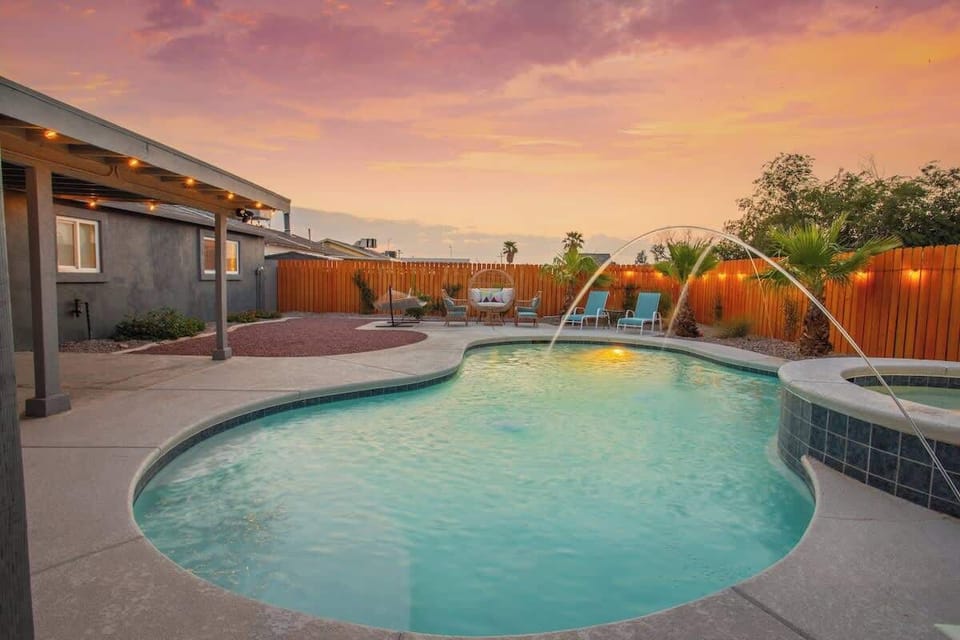 Palm trees surround our backyard- the perfect hangout location for you and your group to take a dip in the pool and enjoy the fabulous Henderson weather!
