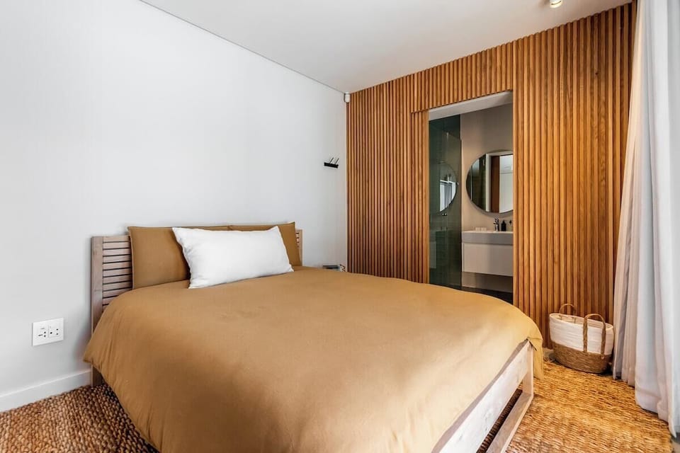 Bedroom 4 is located downstairs by the pool