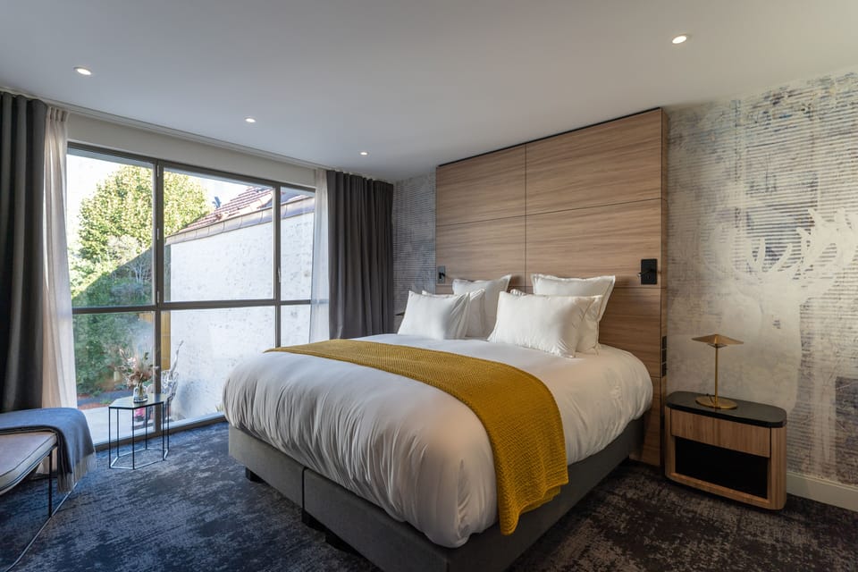 Chambre Deluxe (Le Cube) | Premium bedding, pillowtop beds, minibar, in-room safe