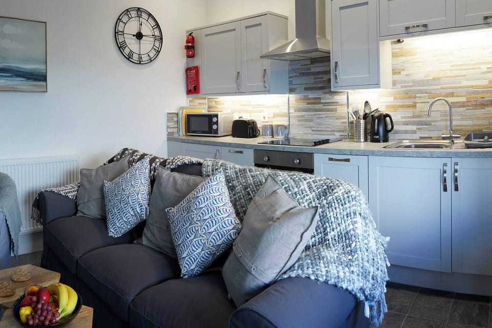 Living Room area accessible to the Kitchen.