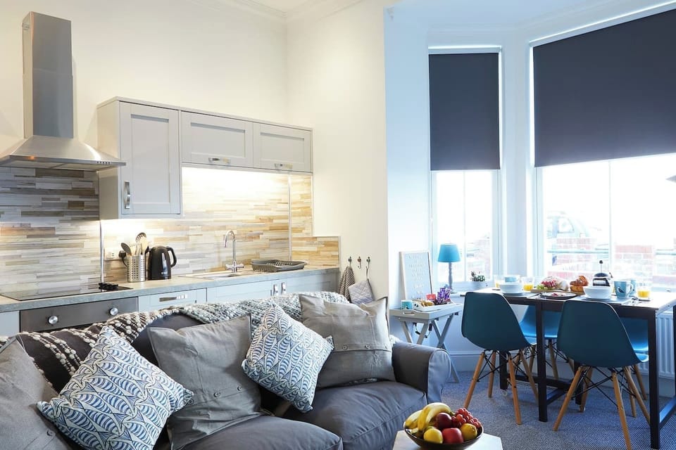 Living Room area accessible to the Kitchen and dining area sea views.