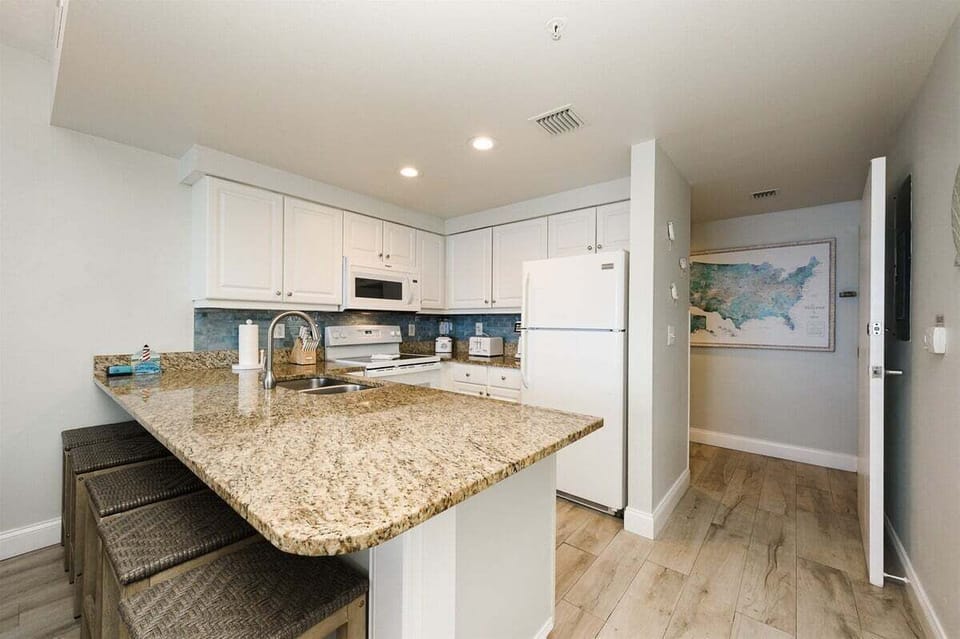 Huge upgraded granite countertops adding more seating