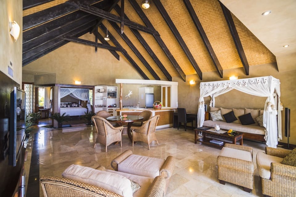 Beachfront Villa | Living room | Flat-screen TV, DVD player
