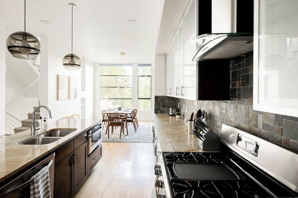 Never miss a minute of the dining experience with the open kitchen and dining areas