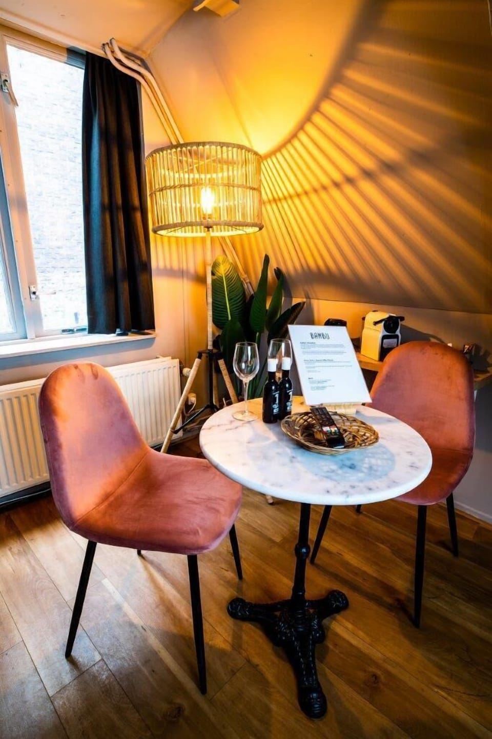 Enjoy your morning brew or a quiet meal in this stylish nook, surrounded by warm tones and organic textures.