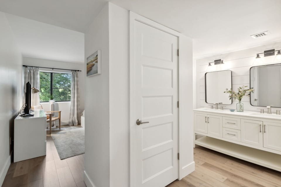 Master Bath with Shiplapped Walls, Double Vanity and Tiled Walk In Shower