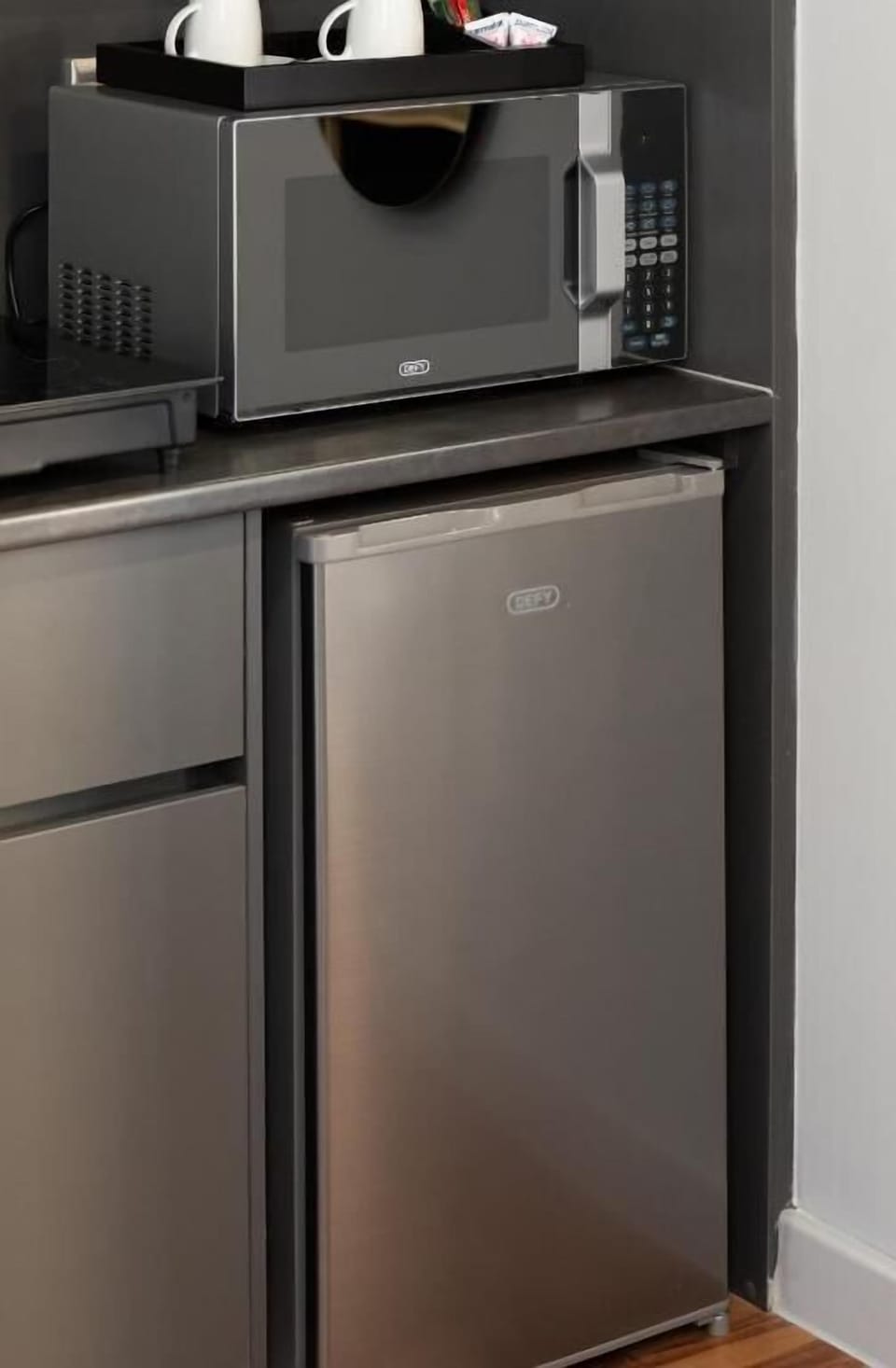 Mini-fridge, microwave, electric kettle, toaster