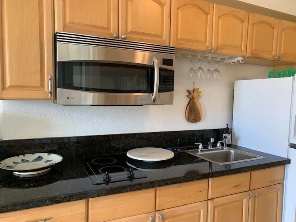 Kitchen with convection oven/microwave Glass top two burner stove top