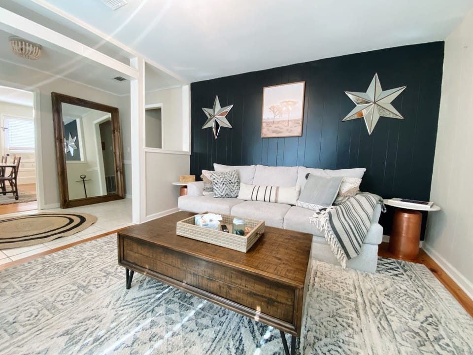 Sit back and relax in our comfortable living space with a plush couch and TV! 