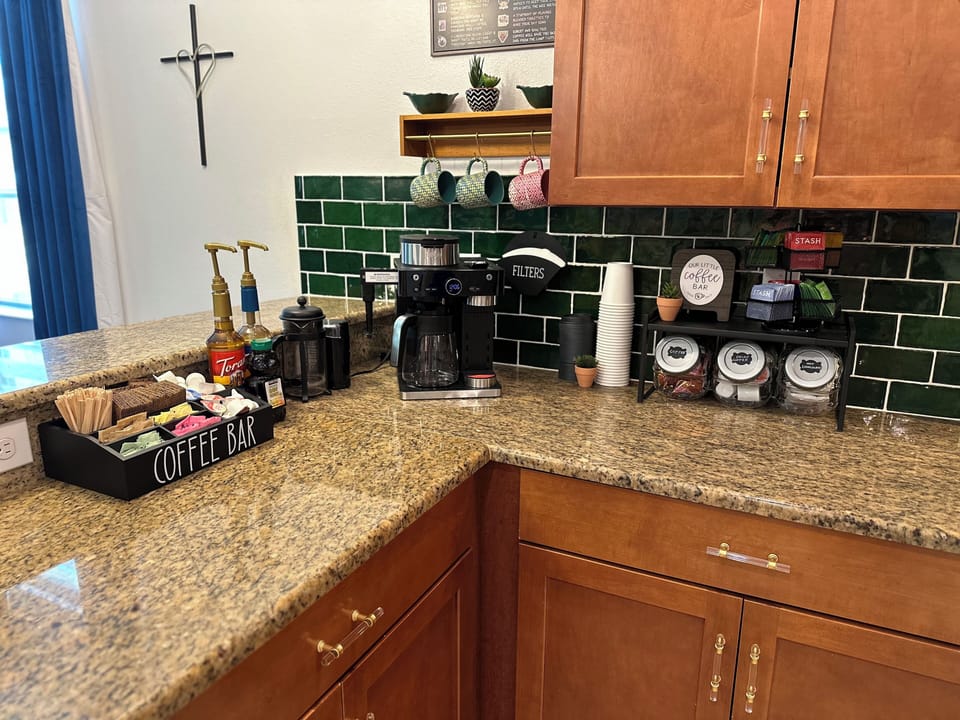 Enjoy a complimentary, fully-loaded coffee station to kickstart your morning.