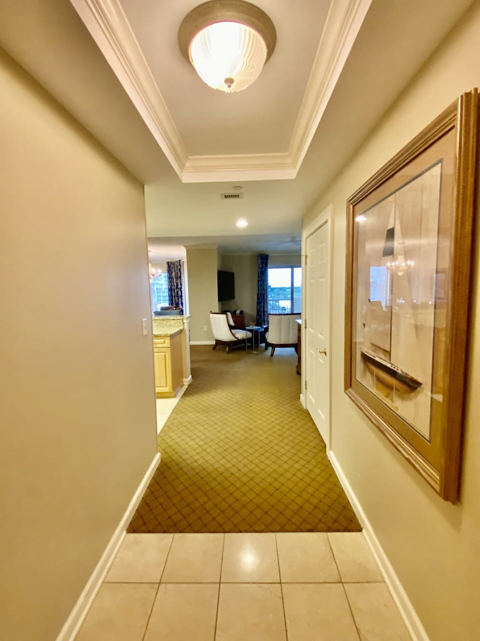Foyer to Spacious Living, Dining Rm & Kitchen.