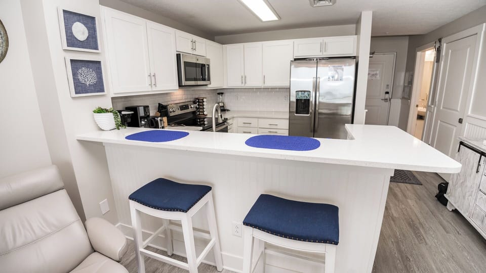 BREAKFAST BAR TO FULL BATH ON THE HALL