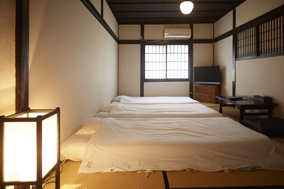 Traditional Triple Room, Multiple Beds (For 3 people,Check in time 4pm-10pm) | WiFi (free), bed sheets