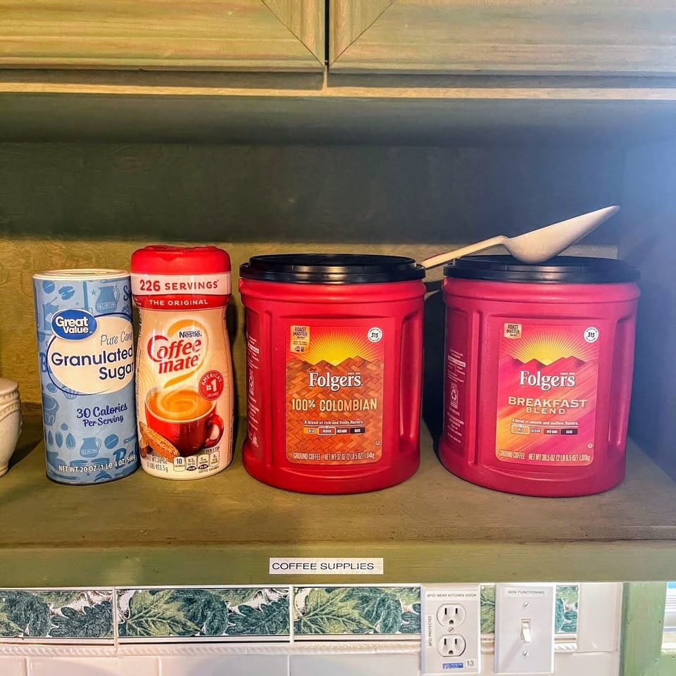Regular and decaf complimentary coffee, sweeter, creamer.