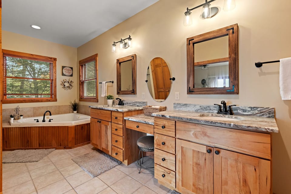 King Master Bathroom with Jetted Tub, Separate Shower, and Granite Countertops
