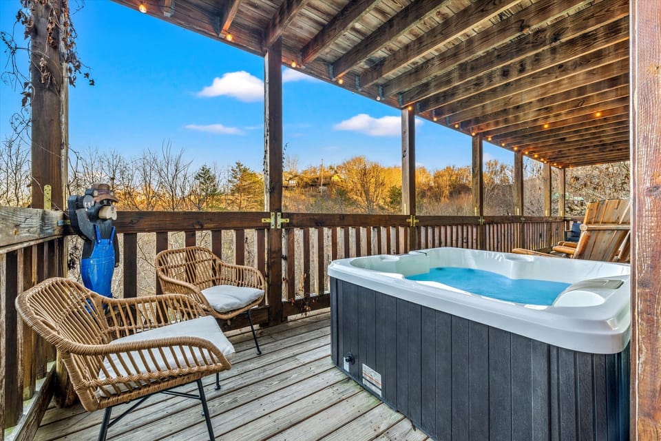 Step onto the private deck to soak in the bubbling hot tub as the mountain breeze moves through the trees providing a peaceful escape from the everyday hustle.