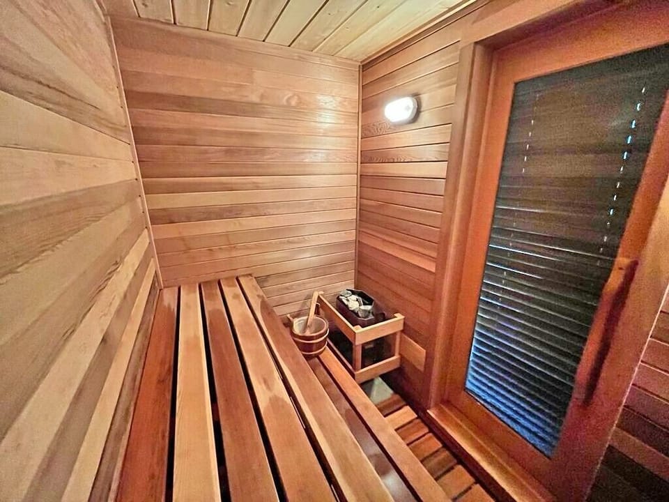 Decompress in the sauna's fresh cedar scent with our sauna towels and your own beverage.