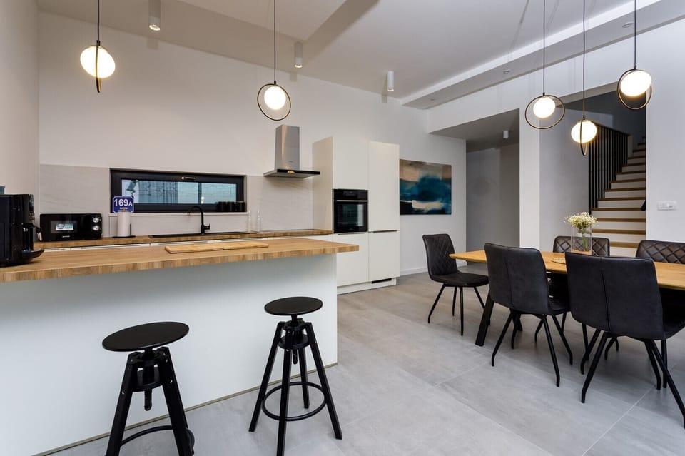  A fully equipped kitchen with all  modern guest needs (dishwasher, microwave oven, toaster, kettle, an espresso coffee machine...and more)