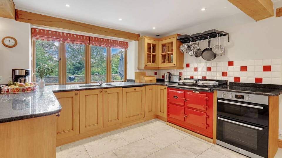 The farmhouse-style kitchen has everything you need to play chef.