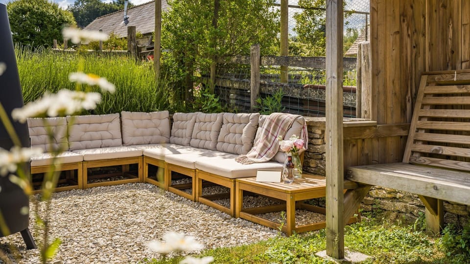 Indulge in a good book on the comfortable outdoor seating, accompanied by the sounds of nature.
