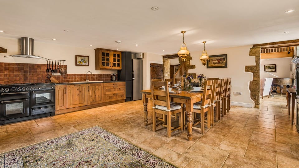 Gather around the large farmhouse dining table with your loved ones.