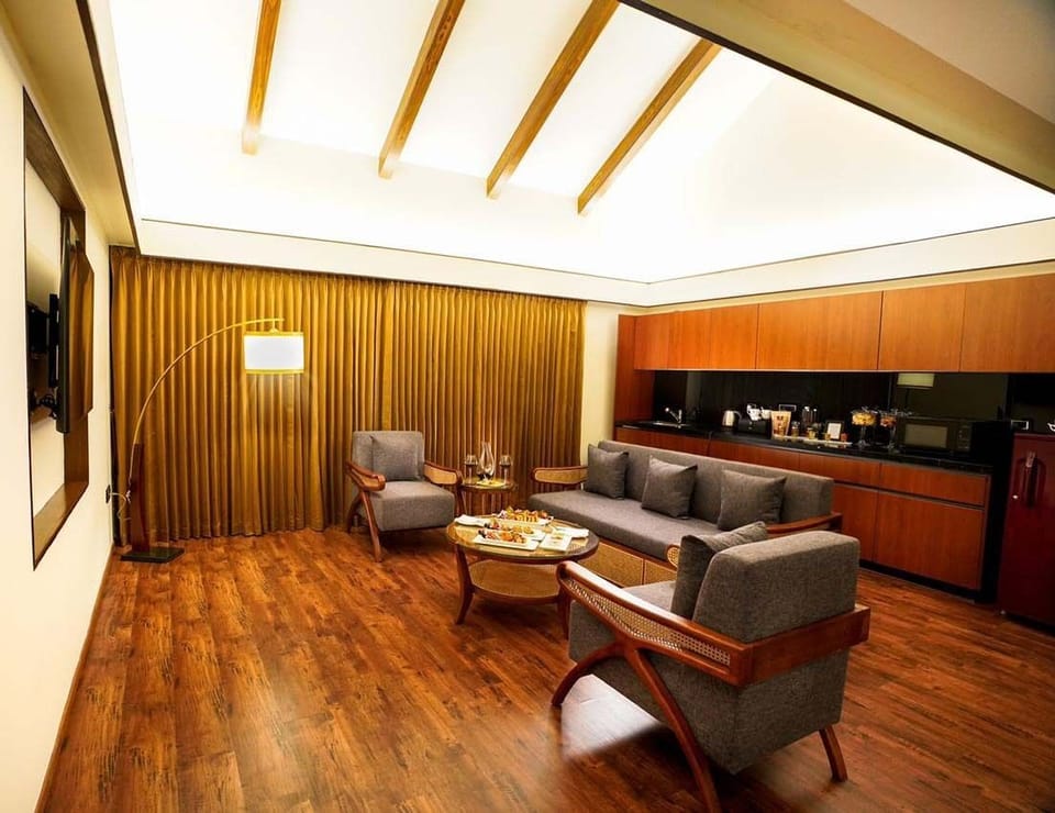 Teak Suite (1 Bedroom accommodation) | Living area | 55-inch LED TV with cable channels, TV