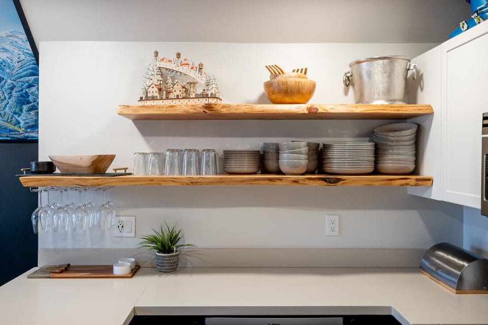 Beautifully displayed plates in this kitchen, adding a touch of personality and charm to every meal.