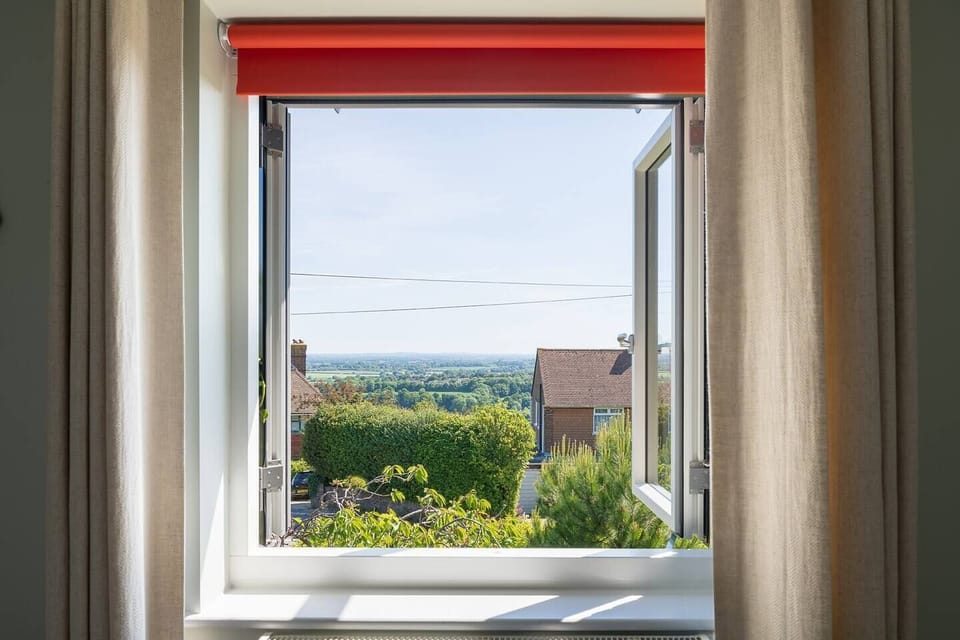 Five of our six bedrooms have dual aspect windows, and the one bedroom that has just one window, has far reaching views over the South Downs.