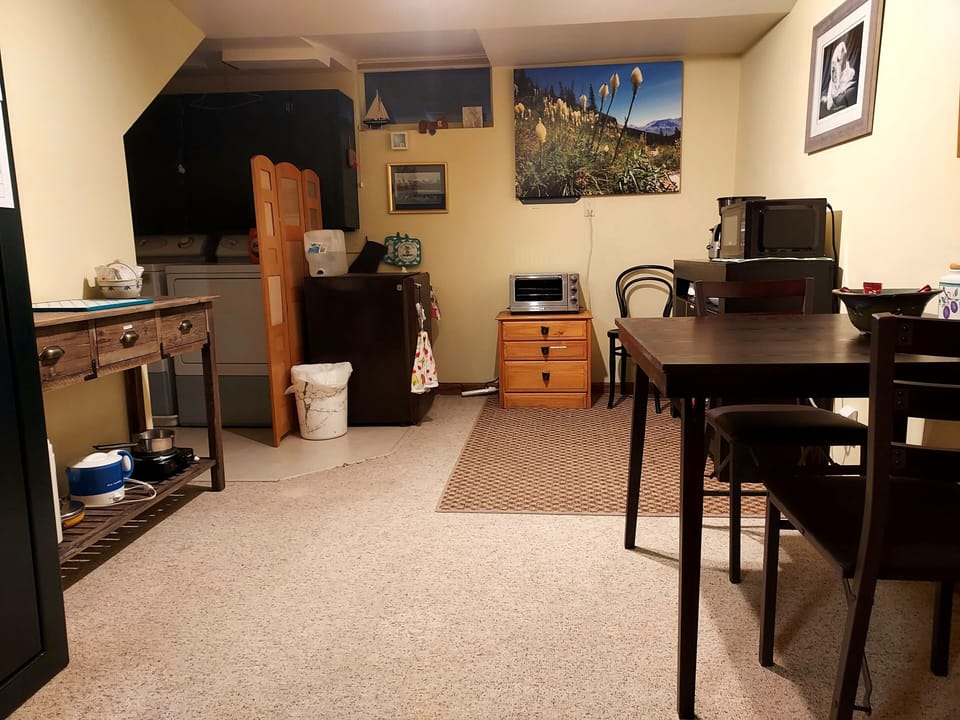 Washer/dryer in the back corner.