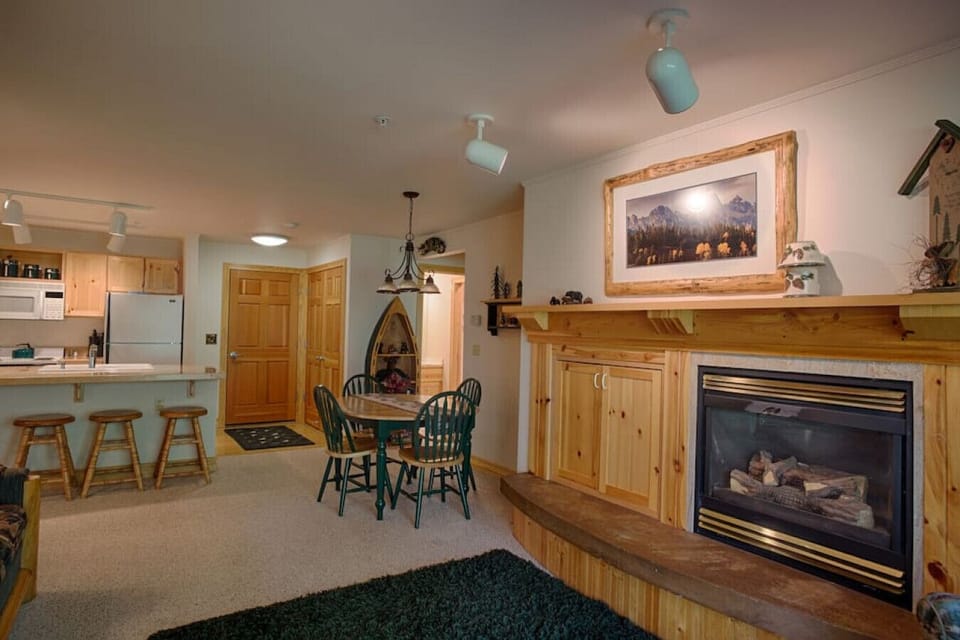 Living/dining area feat. Cozy fire place