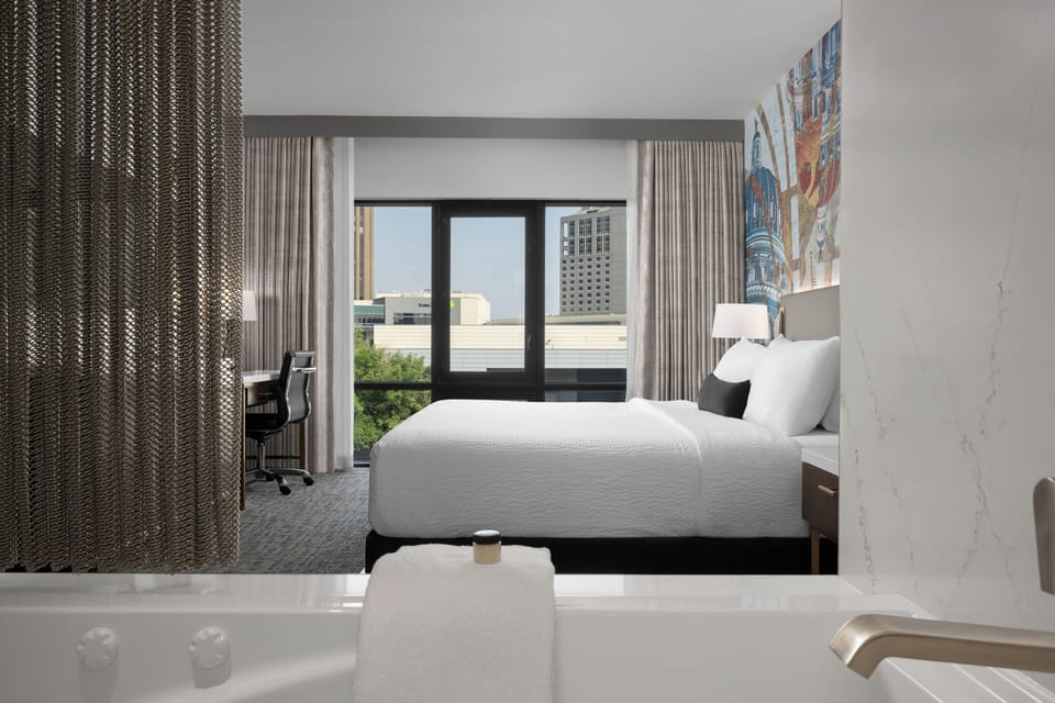 Premium bedding, down comforters, pillowtop beds, in-room safe