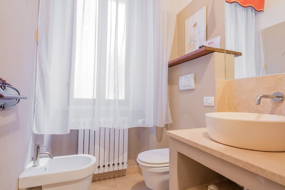 Family Quadruple Room | Bathroom | Shower, bidet, towels