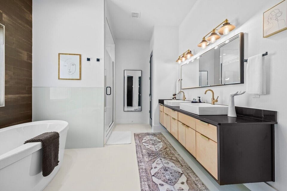 Right off the Master, find our spa like en suite bath with free standing jacuzzi soaking tub, walk in shower, and double vanity.