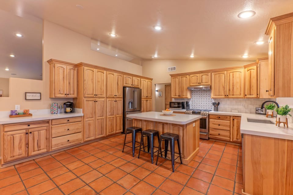 Our completely stocked kitchen has new appliances.