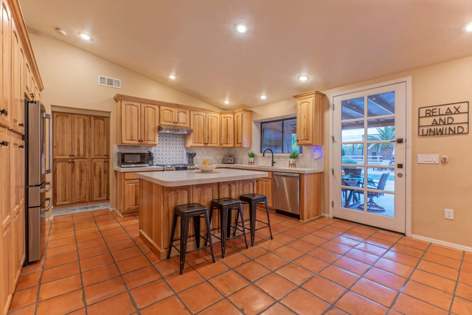 The door in the kitchen leads to the backyard making it easy to transfer meals and snacks.